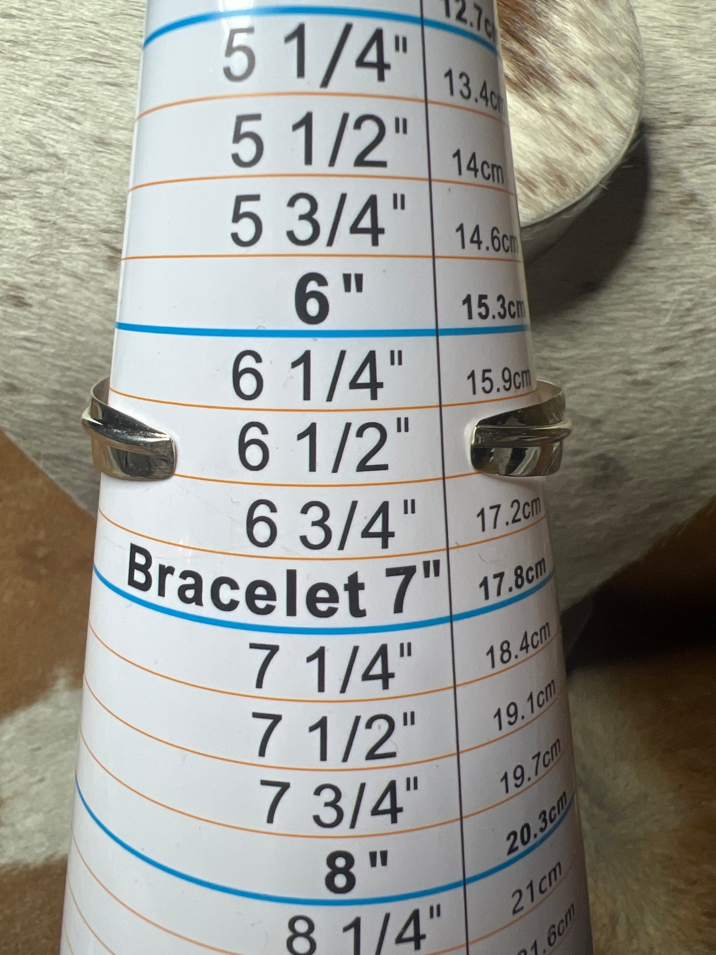 5 Stone Orange Spiny Feather Cuff