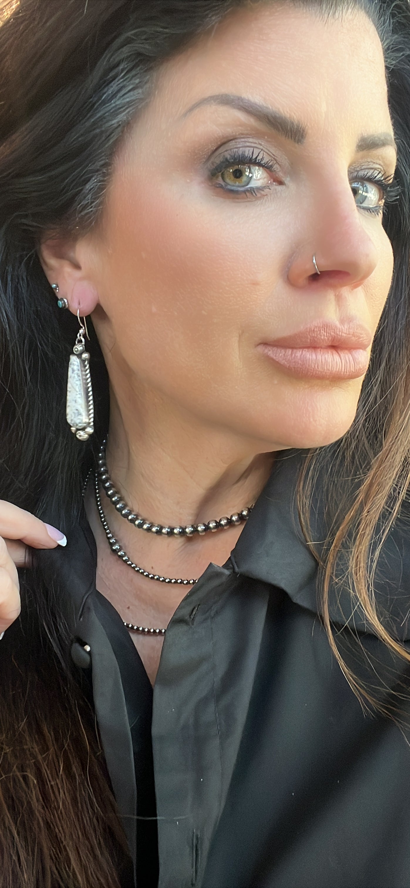 White Buffalo Earrings with Rope Design and Silver Beading