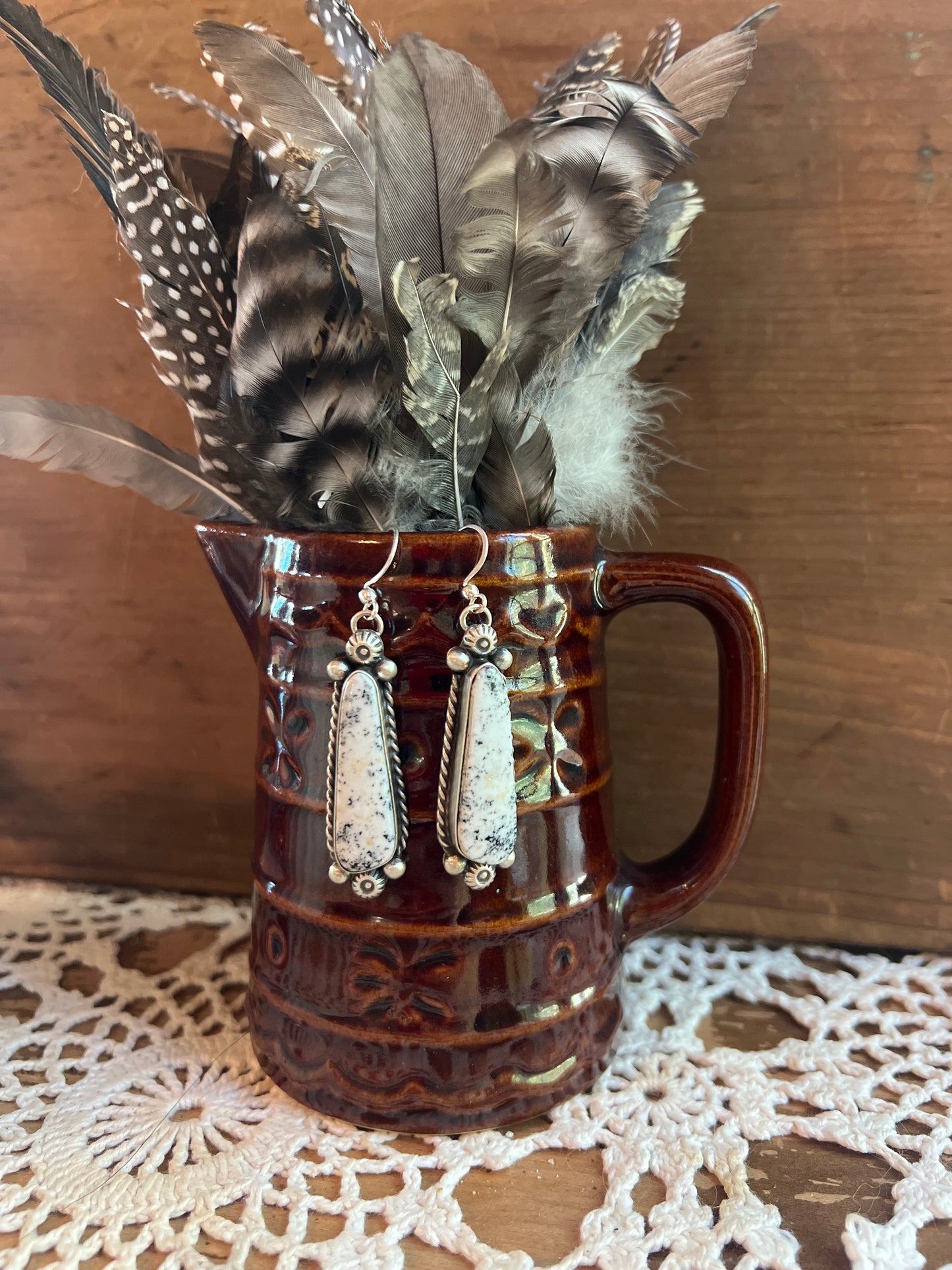 White Buffalo Earrings with Rope Design and Silver Beading
