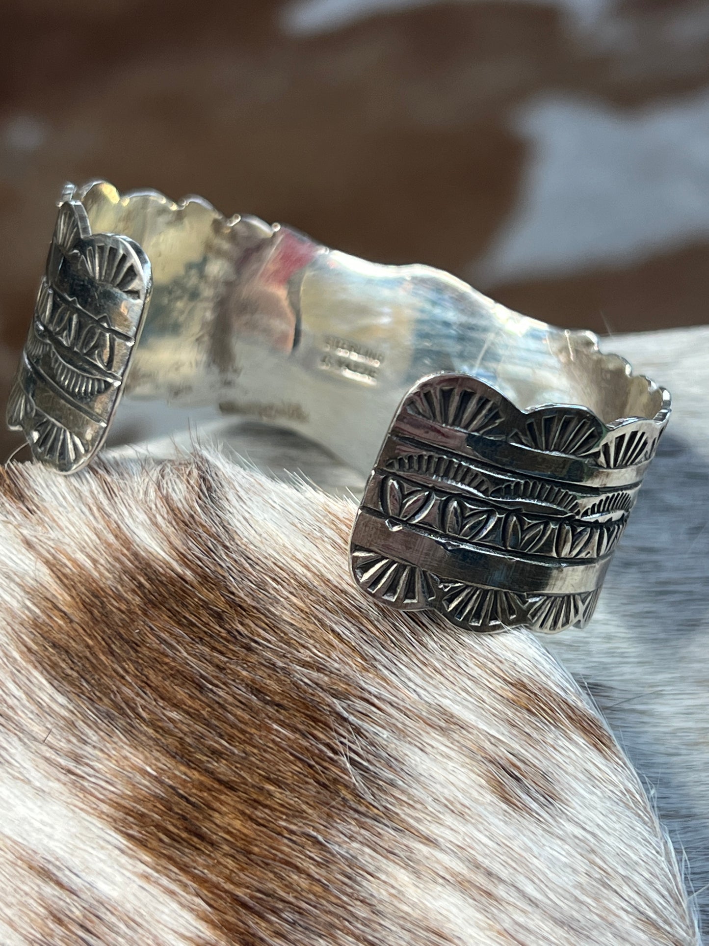 Turquoise with Hearts, Scared Sunrise and detailed stamping cuff by Yazzie
