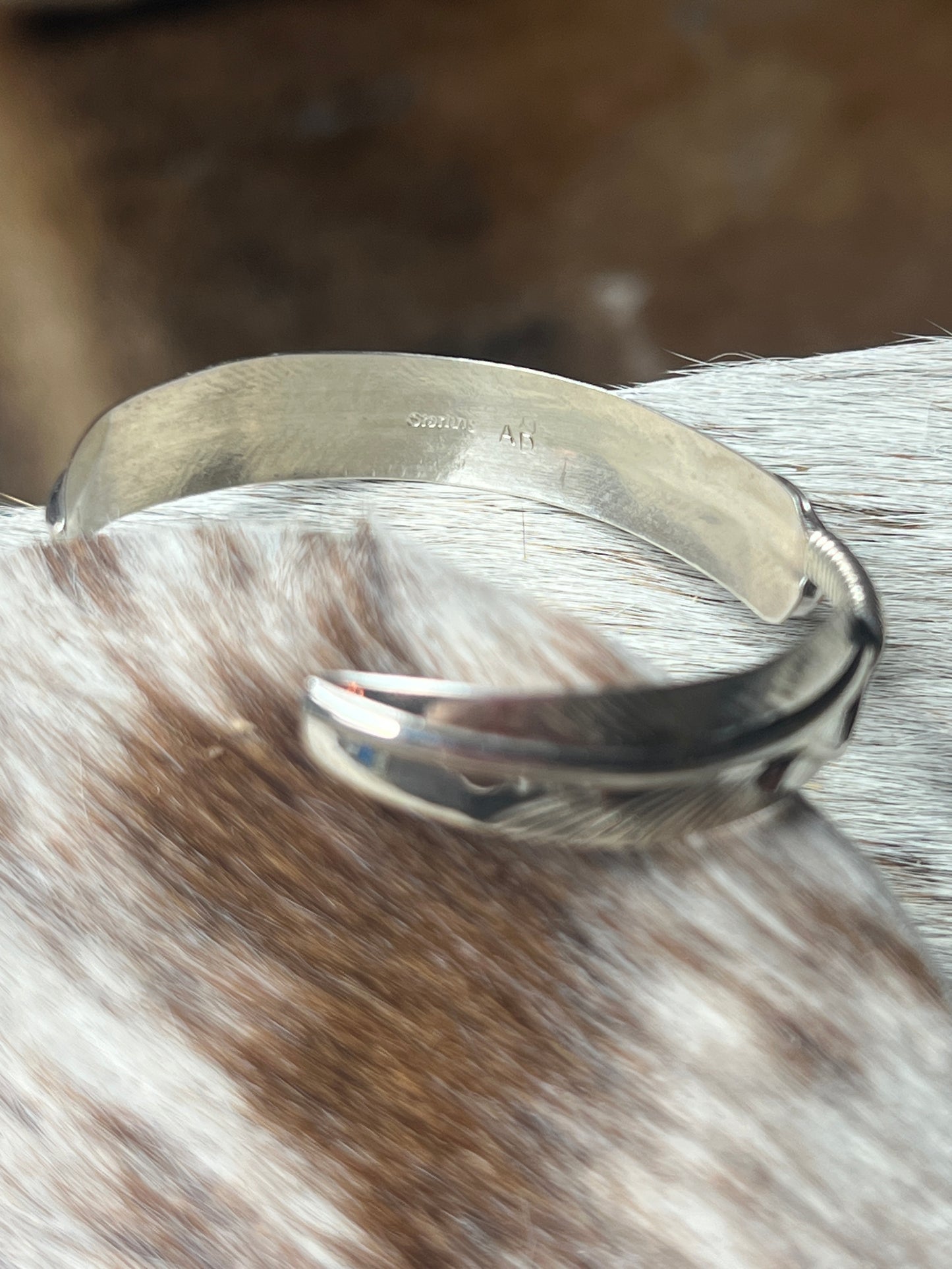 5 Stone Orange Spiny Feather Cuff