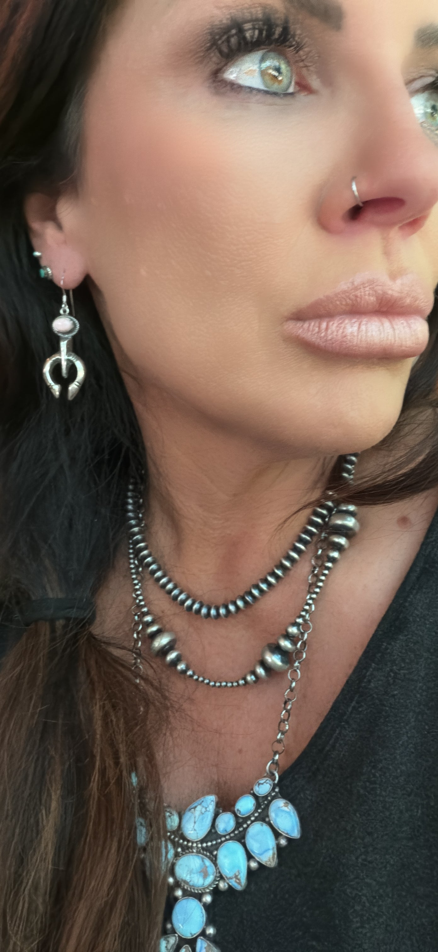Native Made Sterling Silver and Pink Conch Shell Naja Dangle Earrings By Jerryson Henio.