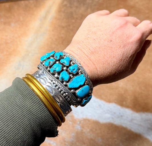 NATIVE AMERICAN MADE TURQUOISE NUGGET AND STERLING SILVER CUFF BRACELET